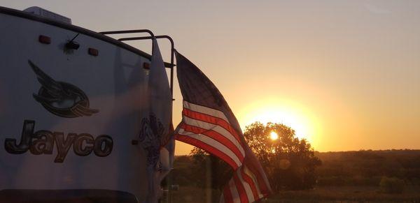 Mobile office parked at sunset