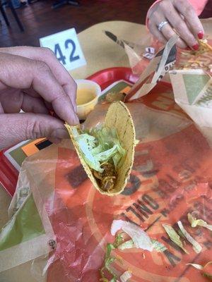 Taco with beef lettuce and cheese at Taco johns or the lack there of!