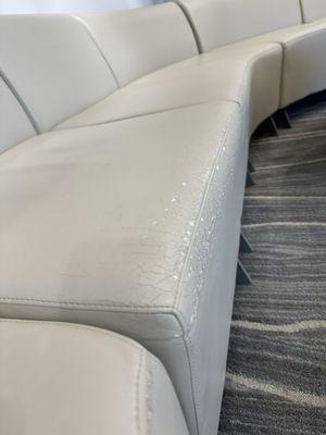 Waiting room. Pretty much all the pleather seating was cracking like this.  Does this bother you?