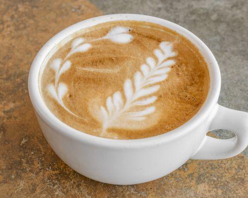 Indulge in the creamy richness of our classic Latte - the perfect blend of espresso and steamed milk. Pure comfort in every sip.