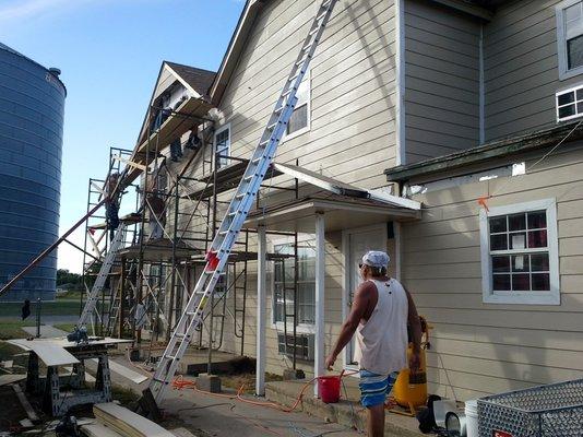 Exterior Renovation Hardiplank installation, new windows, doors, porch roofs with foundation, framing and sheathing replacement