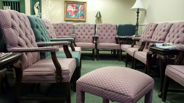 The waiting room has a nursery feel to it. I love the chairs and ottomans. Tons of seating in the waiting room!