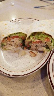 Greek Grilled Chicken Wrap = grilled chicken, iceberg lettuce, diced tomatoes, cucumbers, feta cheese, Greek dressing