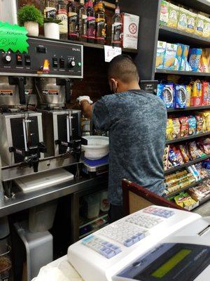 Owner/Barista making a fresh juice to order