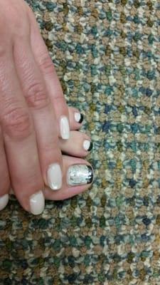 Mani terrible, see spots she missed& lines in the polish, SHE decided to do a BLACK TIP pedicure! Looks like dirty toe nails!