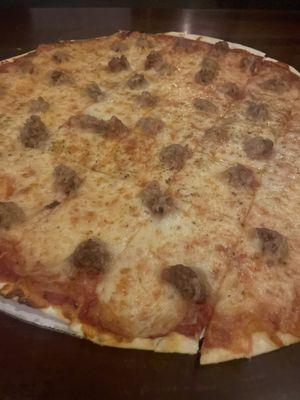 Sausage thin crust pizza