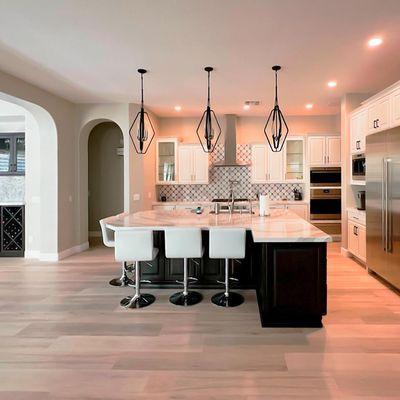 Elevate your kitchen's aesthetic with a remodel that features clean lines and a harmonious color palette.