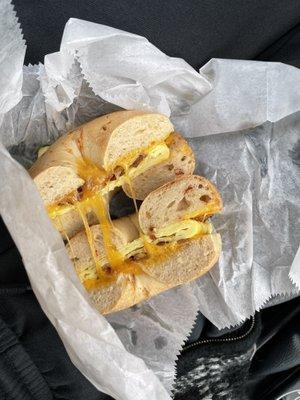 Bacon egg and cheese on a sun dried tomato bagel