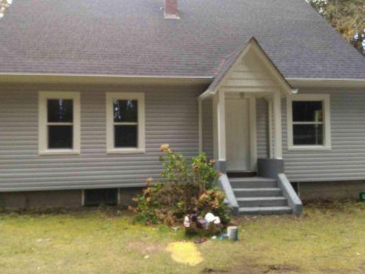 Siding after front view house #1