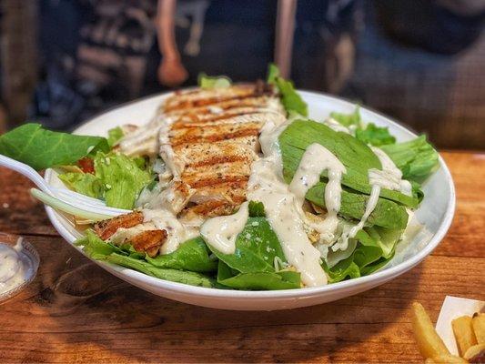 The Chicken Caesar id not tossed and the salad mix is Whole-leaf. Makes it a little unwieldy.