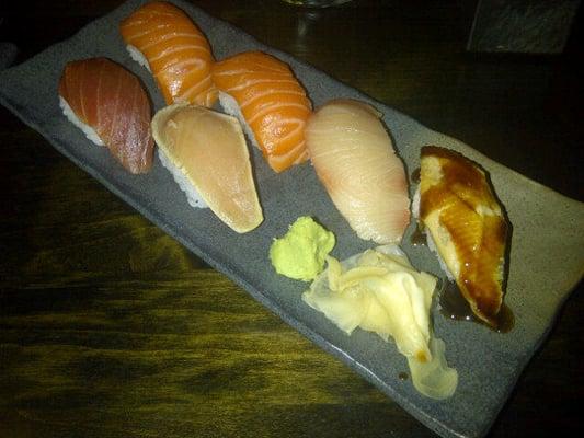 Assorted sushi:  2 Salmon, 1 Hamachi, 1 Sea Eel,  1 Albacore Tuna, 1 Big Eye Tuna,  Wasabi and Ginger