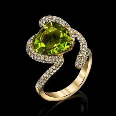 This design features a 4.57 carat peridot set in 18K yellow gold.