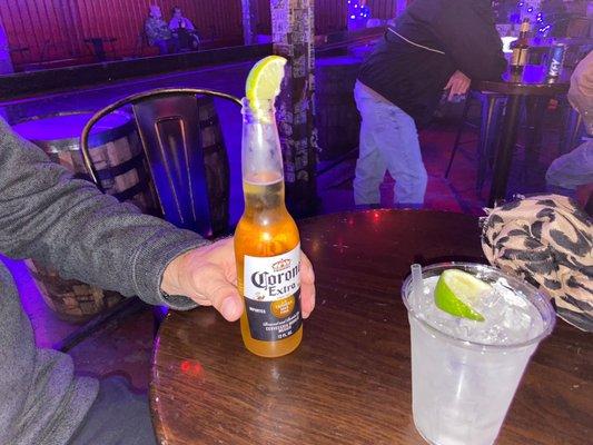 Corona with lime and a double Tito's and soda