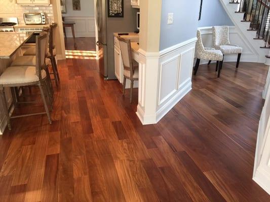 Brazilian Teak hardwood flooring through out the main level