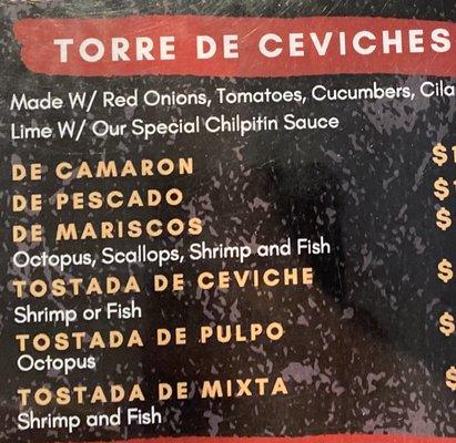 Description of what is in the Tower/Torre - octopus, scallops, shrimp, fish that is prepared in a fresh diced vegetable and citrus blend!