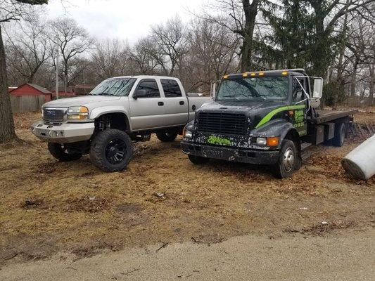 Look how tall that chevy 2500 is. Makes a big truck look small