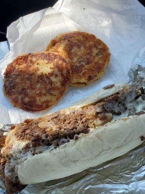 Philly cheesesteak and Tater cakes