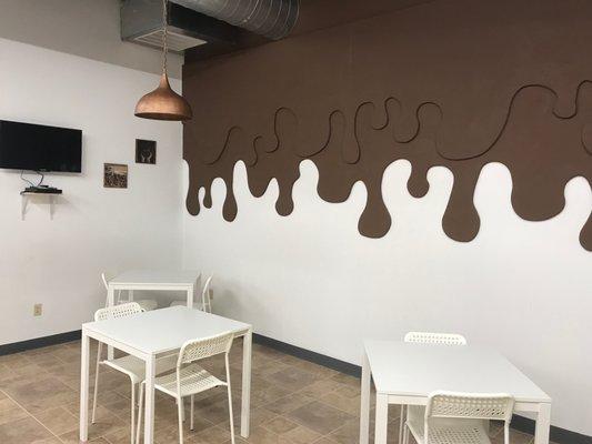 Enjoy your chocolate in our cafe, complete with a chocolate drip wall!