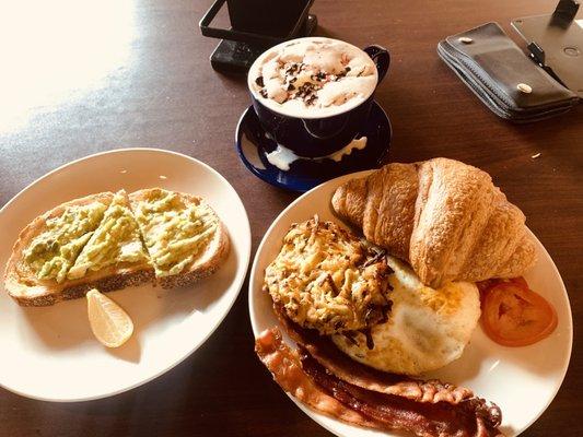 French breakfast with avocado  toast and peppermint mocha .