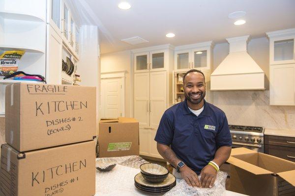 Chris showing off his packing and moving skills.  Suburban solutions have the best packers and movers in Springfield, PA