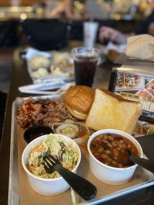 Pulled pork, coleslaw, beans. The beans were very good.