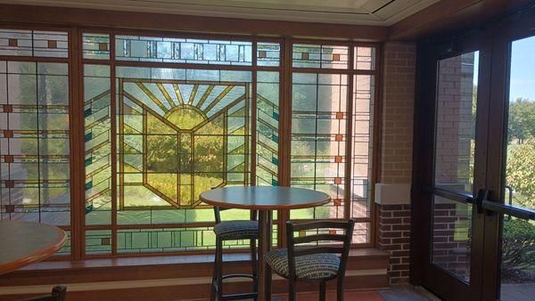 Beautiful stained glass sitting, viewing area.