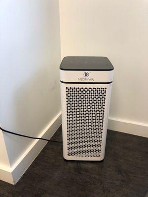 Extra COVID measures in place. Air purifier in the office