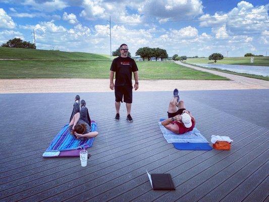 Jeff coaching attendees of one of the outdoor bootcamps.