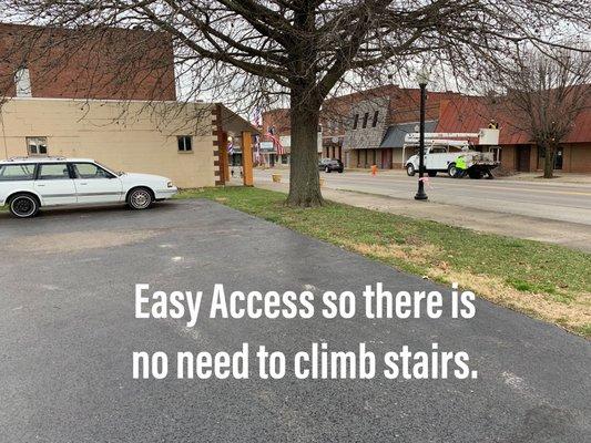 Don't worry about stairs. There is a parking lot on east side of building that connects directly with the sidewalk to enter my office!