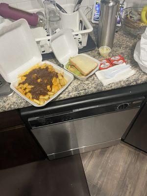 Chili cheese fries and fish sandwich