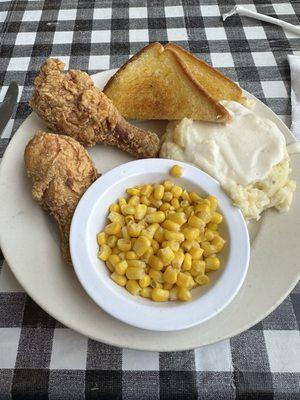 Fried chicken mashed potatoes and corn.