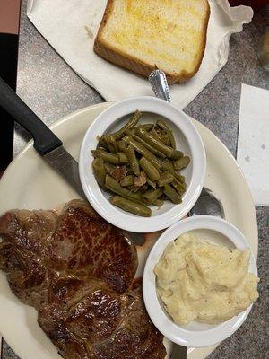 Ribeye, creamed potatoes, green beans and Texas toast