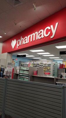 A view of the pharmacy counter from the waiting area.