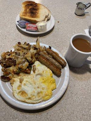 Two eggs, sausage links, and home fries