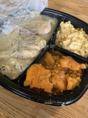 Stewed chicken with rice, yams and Mac and cheese