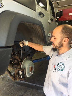 After a proper 27 point inspection it was determined that the Jeep needed new brakes. Performing a complete rear brake service!