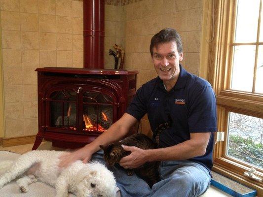 Owner, Bill in front of his home stove.