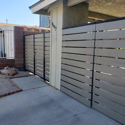 Installed, manufactuted All grey and black materials.black steel poles, gate & e-lock single person entry gate. Las Vegas, NV 2018