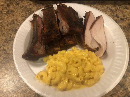 Pork ribs, Sliced turkey, and Mac and cheese