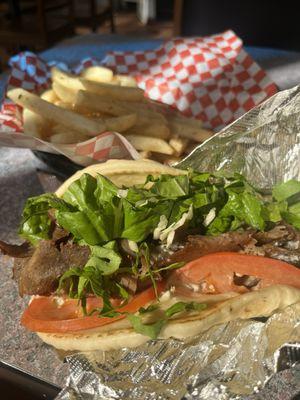 Gyro with hot, fresh fries. Such green lettuce and ripe tomatoes.