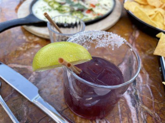 Sickening sweet Marionberry margarita. The gelatinous queso dip in the background.