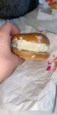 this is my untoasted cold bagel with a half a block of cream cheese on top. unacceptable. who on earth would order this.