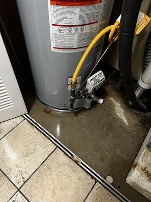 water standing under BRAND NEW water heater