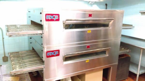 Brand new pizza oven. Double conveyor pumps out pizzas fast and crispy