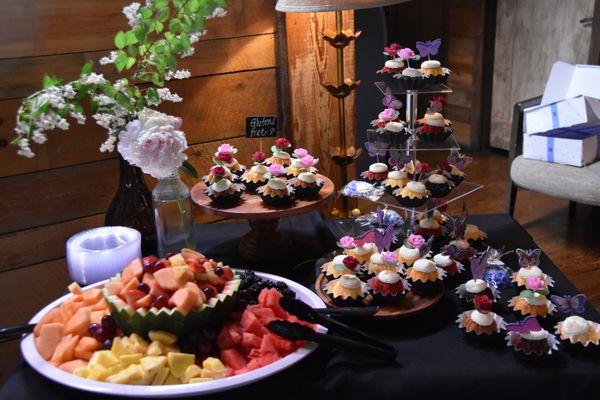 Look at that fruit platter and how the cake table was set up!