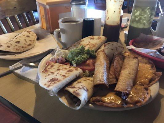 Number 7, carne guisada/enchilada plate, with a chalupa on the side. Botana sampler; beef quesadilla, nachos, and chicken flautas.