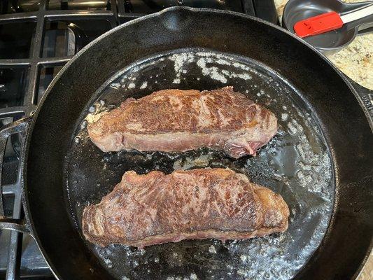 These beauties are wagu NY Strip.  Omg.  Like butter.   Cast iron is the only way to go.