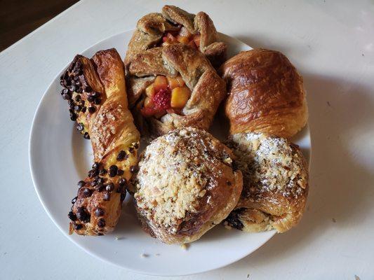 Twice baked almond croissant, torsade, chocolate croissant and a galette.