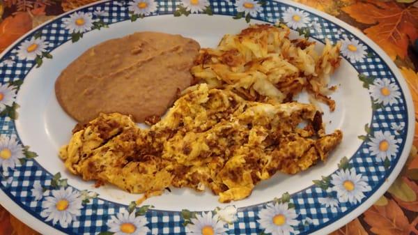 Chorizo & egg plate with hash browns, beans and tortilla.  (#6 under breakfast plates).   Very tasty chorizo!!!