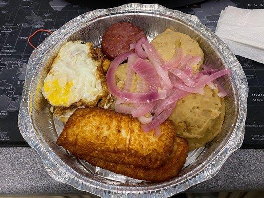 Los Tres Golpes - Eggs, salami, and fried cheese with mashed green plantains